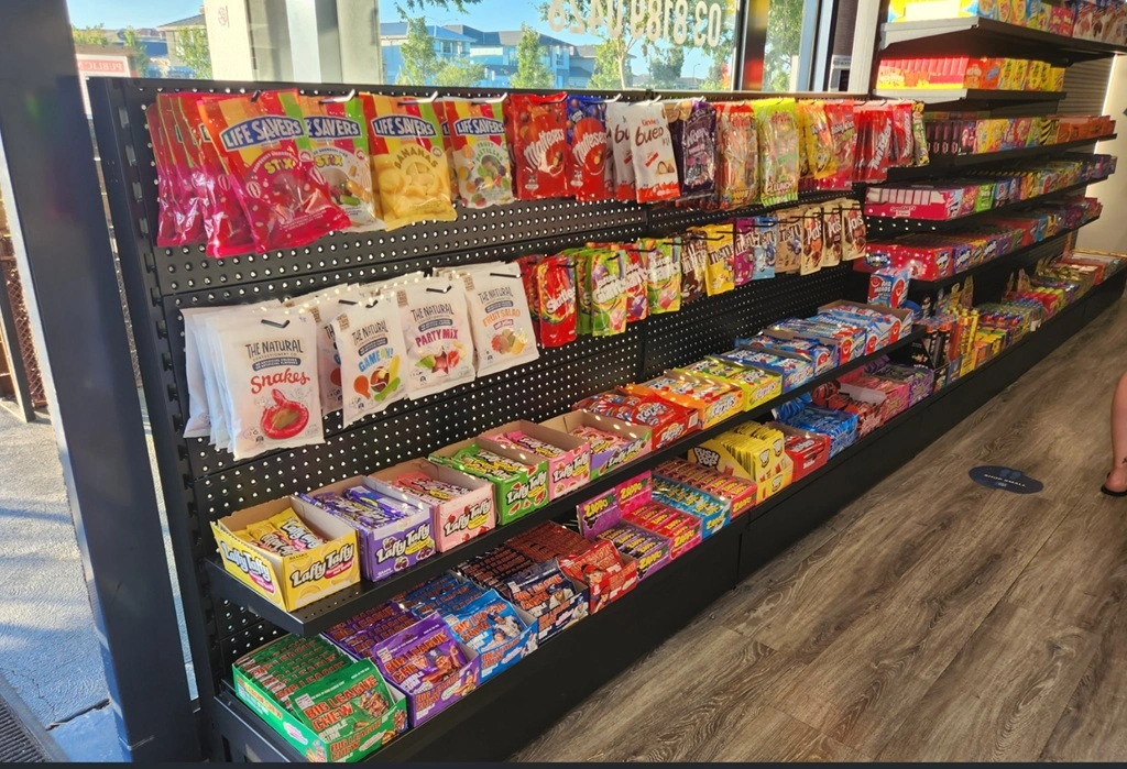 Products on dislay using Dinya Design's Single Sided Pegboad Volcano Gondola Shelving and heavy duty hooks